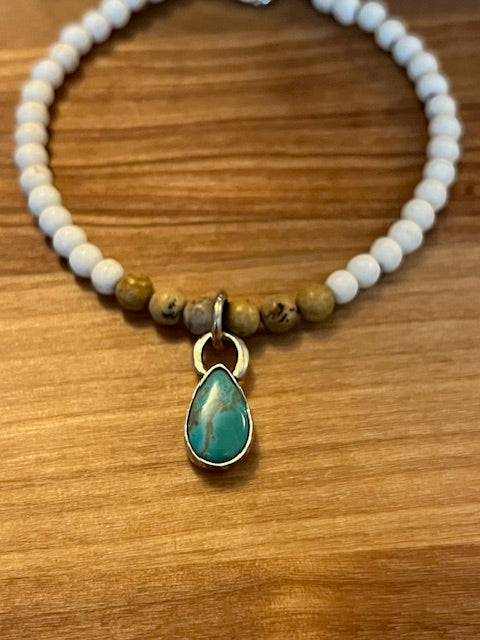 Stone beaded bracelet with turquoise charm