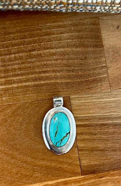 Handcraftd oval Turquoise pendant in sterling silver