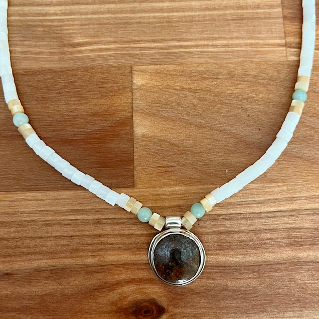 Shell bead necklace with turquoise pendant