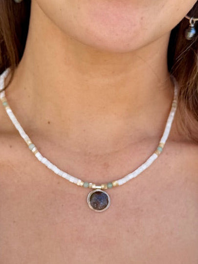 Shell bead necklace with turquoise pendant