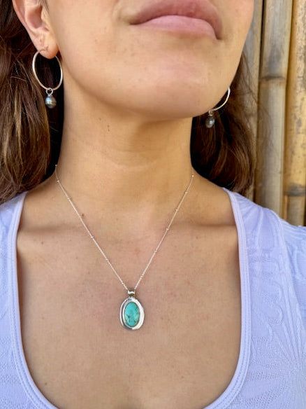 Handcraftd oval Turquoise pendant in sterling silver