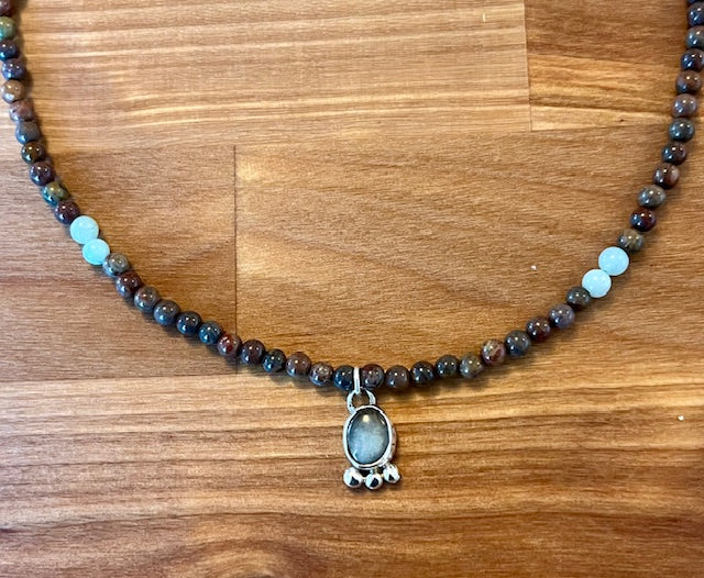 Natural bone beaded necklace with turquoise charm